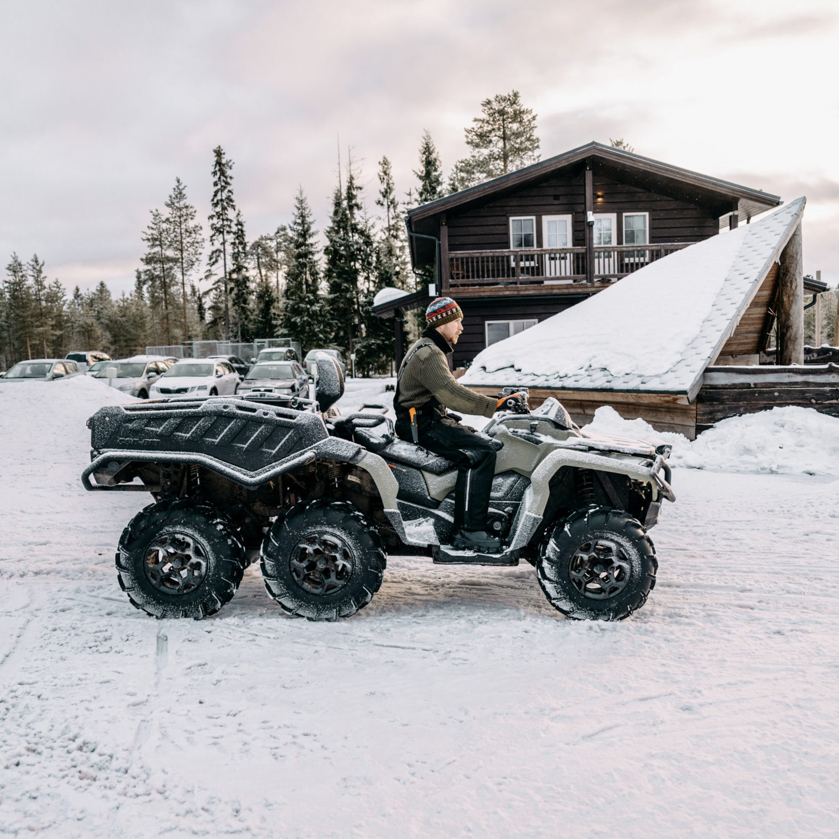Staff member driving the ATV